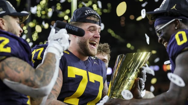 Michigan offensive lineman Trevor Keegan celebrates a 34-13 win over Washington at the national championship game at NRG Stadium in Houston on Monday, Jan. 8, 2024.